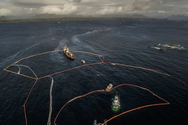 An aerial photograph of the Nathan E. Stewart oil spill cleanup near Bella Bella, BC, Canada.