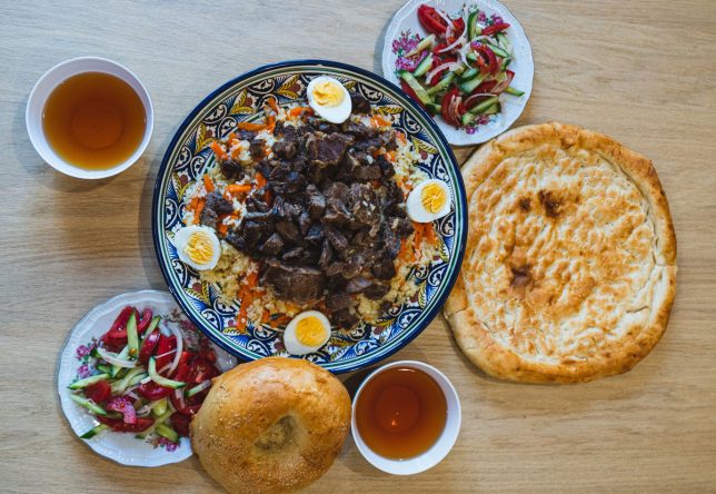A meat and rice dish and salads belonging to the Uyghur tradition of cooking.